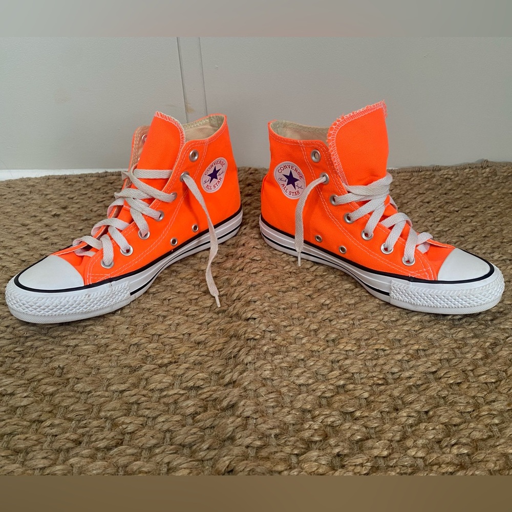Neon orange converse high tops